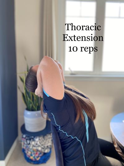 Thoracic extension stretch over the back of a chair