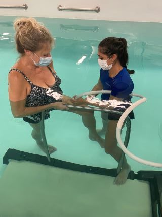 Aquatic therapy session in the LiquidGym pool