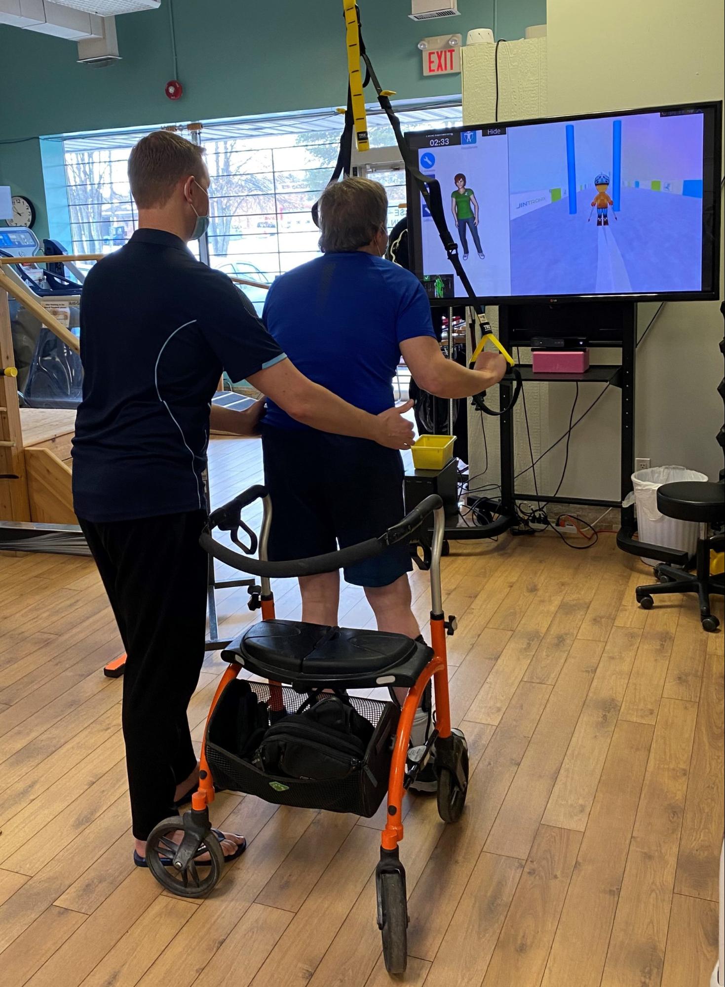 Gait training with a walker and movement feedback on screen