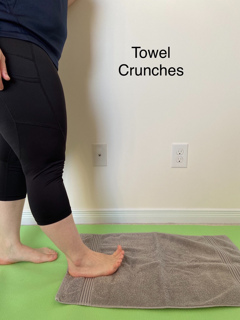 Towel crunches with the toes to strengthen the foot muscles