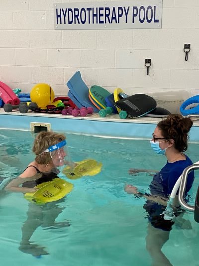 Patient exercising in the LiquidGym hydrotherapy pool