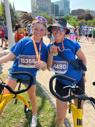 Two riders with medals at the finish