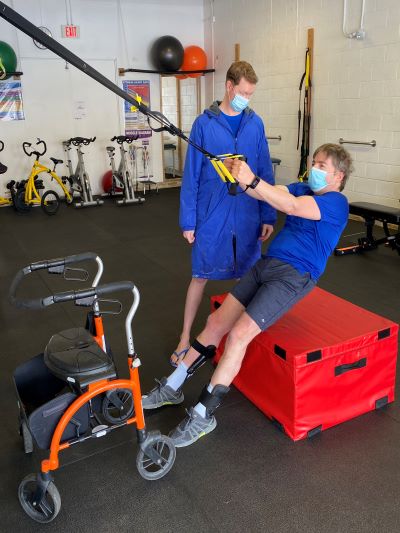 Land-based balance and strength work with a therapist