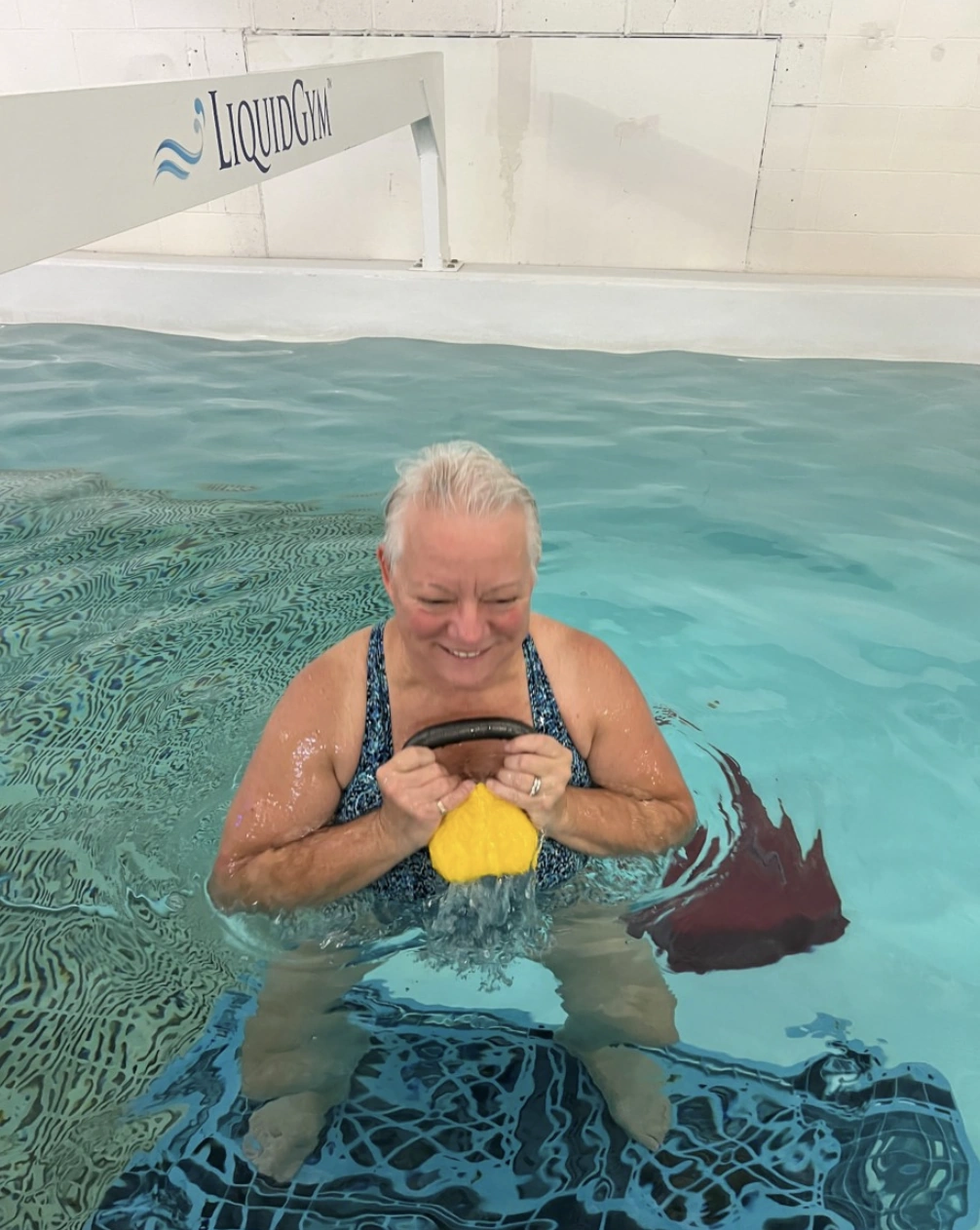 A veteran doing water-based physiotherapy