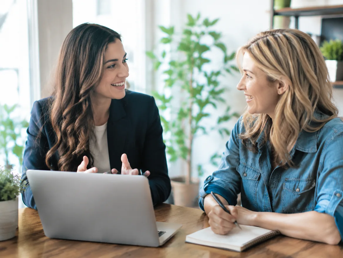 A friendly strategy consultation between a marketer and a small-business owner