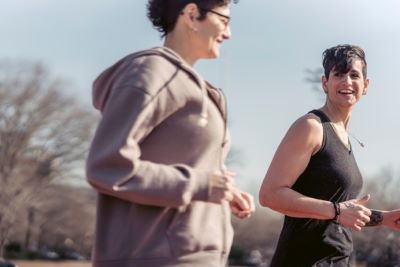 Two people walking and talking during exercise